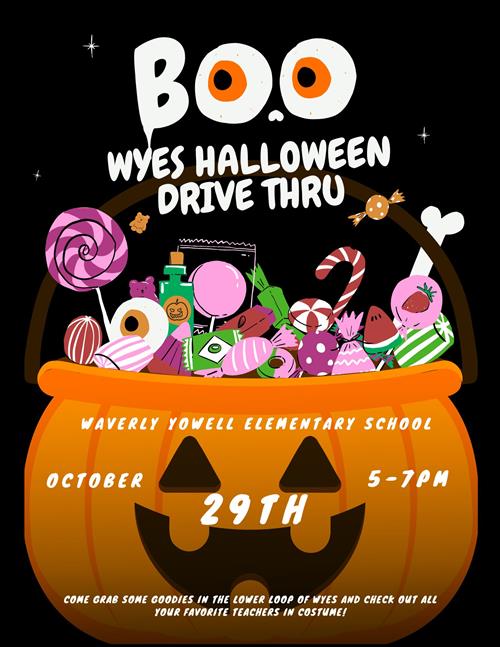  Pumpkin filled with candy and WYES Halloween Drive Thru information written on the front